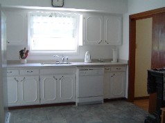 Updated kitchen with new counters, flooring, sink,taps,light fixtures and dishwasher. 