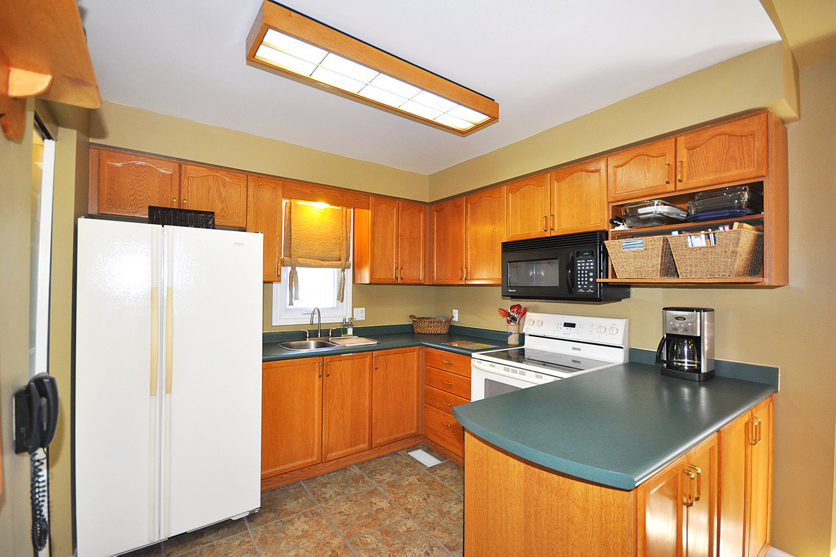 Eat in Kitchen has pantry & overlooks spacious Family Room