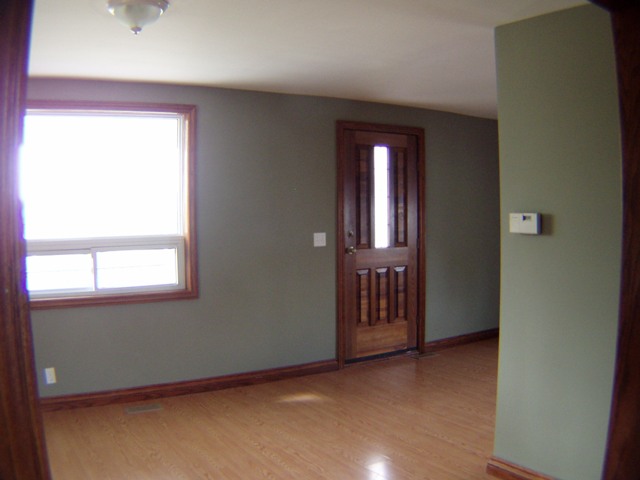 Open Plan Living Room with Newer Front Door & Windows