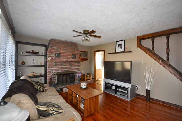 Spacious Living Room with newer laminate flooring