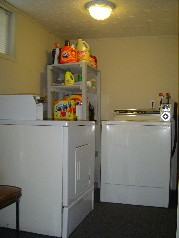 Coin operated washer & dryer located in the lower level 