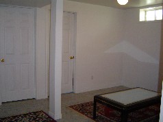 Lower level has a seperate side entrance, 2 bedrooms with large windows and a living area 
