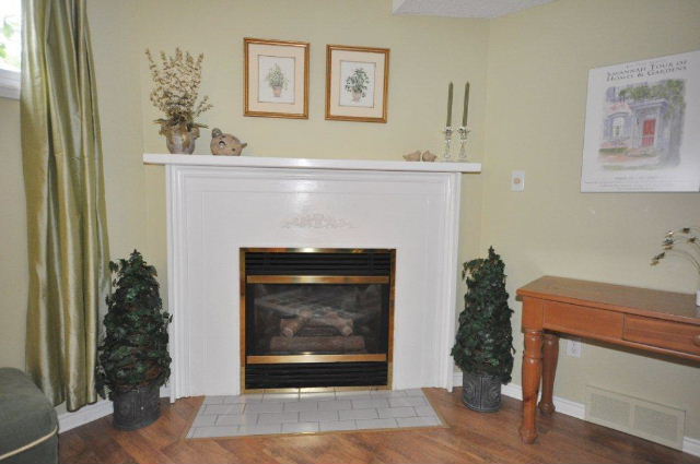 Corner gas fireplace in family room