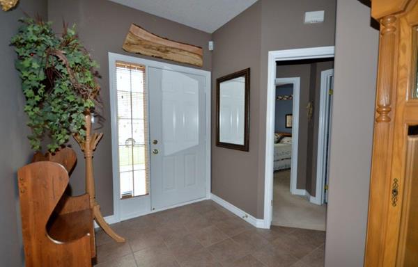 Front Foyer with view of Door to Guest Suite