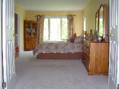 Huge, bright, master bedroom with access to deck 