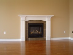 Spacious family room with gas fireplace and more hardwood. 