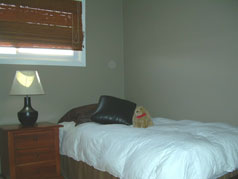 One of three bedrooms all with hardwood floors