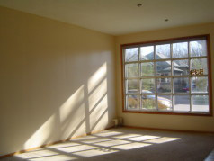 Main floor has huge living and dining room with large sunny window