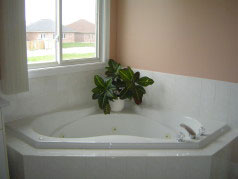  Enjoy a soak in the ensuite whirlpool after a hard day at work