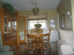  Dining room with gleaming hardwood floors