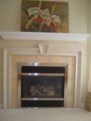 Custom stucco corner gas fire place also visible from kitchen and eating area