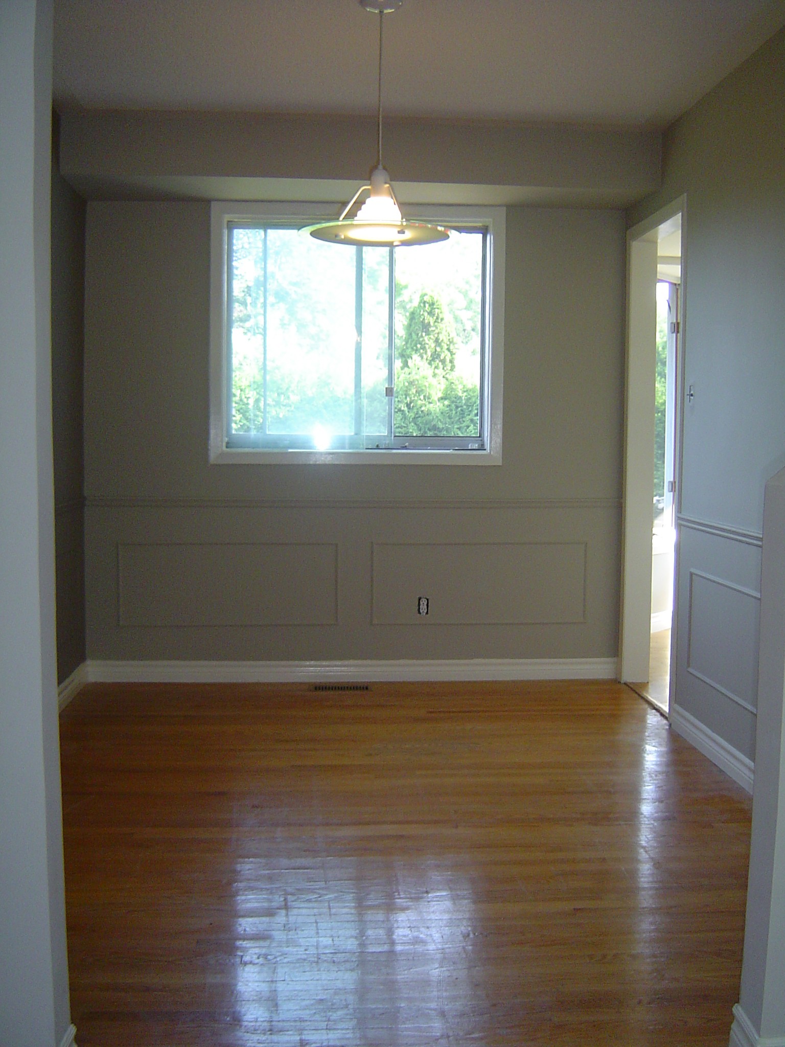 Dining room with gleaming hardwood floors